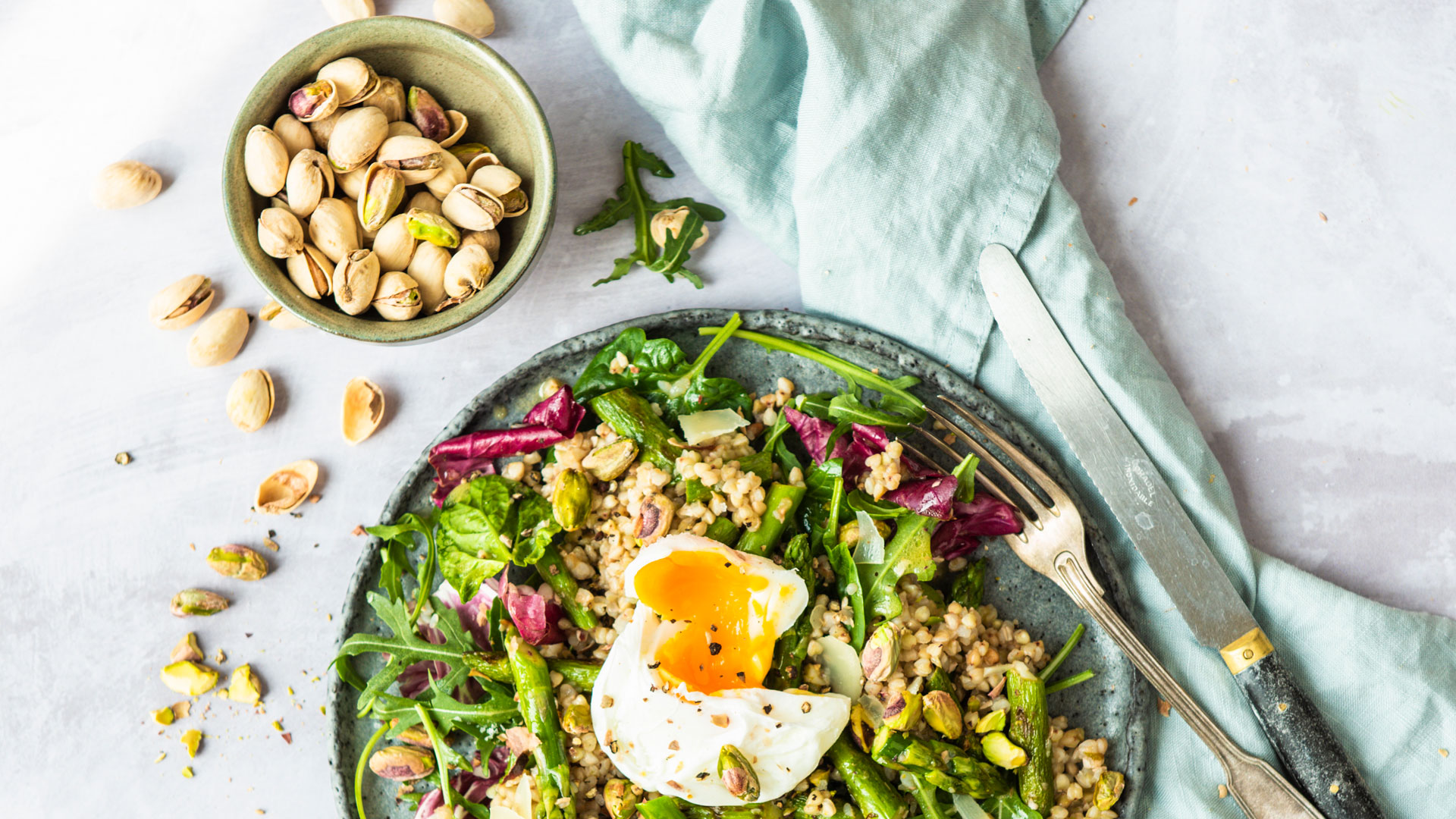 Asparagus-Buckwheat Salad with Roasted Pistachios and Poached Egg